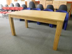 A light oak dining table