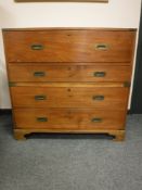 A camphor wood military style secretaire four drawer chest,