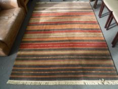 A striped fringed rug