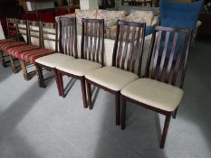 Four stained beech rail back kitchen chairs