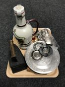 A tray of silver plated cutlery, iron, brass desk clocks, decanter, platter,