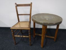 A folding brass topped table and a bergere seated bedroom chair