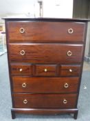 A Stag Minstrel seven drawer chest