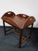 A mahogany butler's tray on stand