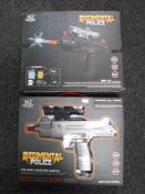 Two boxed of regimental Police mini Uzi electric water capsule guns