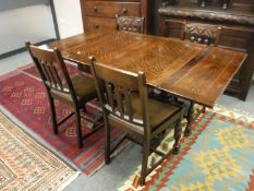 An early 20th century carved oak six piece dining room suite - buffet sideboard,