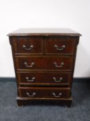 A Regency style five drawer chest