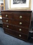 A Georgian mahogany five drawer chest