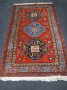 A Caucasian Kazak rug,