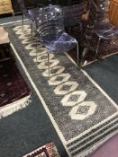 An Afghan design runner,