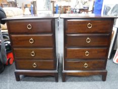A pair of Stag Minstrel four drawer bedside chests