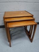 Two nests of three teak G Plan tables