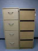 Two wooden four drawer filing cabinets,