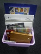 A box of artist's books and supplies