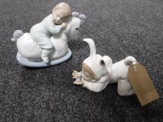 Two Nao figures of boys CONDITION REPORT: In good condition with no apparent faults.