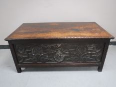 An antique oak blanket chest