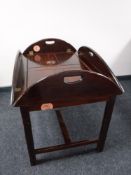 A mahogany butler's tray on stand