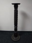 A Victorian mahogany torchere