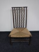 An early 20th century beech bedroom chair