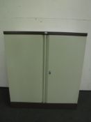 A metal office stationary cupboard