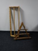 A blonde oak wall rack and a triangular wall rack