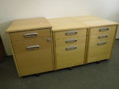 Three under desk chests in pine finish