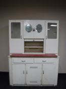 A mid 20th century kitchen cabinet