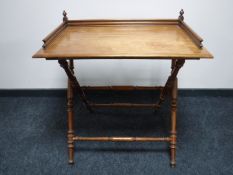 A mahogany butler's tray on stand