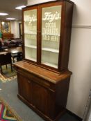 A Victorian and later display cabinet on stand bearing 