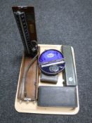 A tray of five cased medical instruments