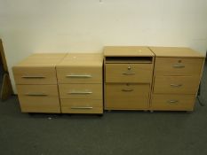 Four office under desk chests in a pine finish