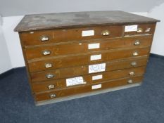 An early 20th century plan chest fitted seven drawers
