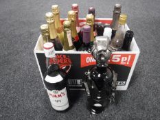 A box of fifteen bottles of assorted alcohol - Lindisfarne Mead, Pimms, wines,