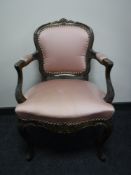 A French salon armchair in a pink silk fabric