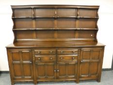 An Ercol farmhouse kitchen style dresser,
