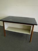 A 1970's Danish desk on teak legs