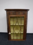 A 19th century mahogany glazed door corner cabinet