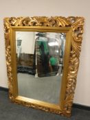 An ornate gilt framed mirror,