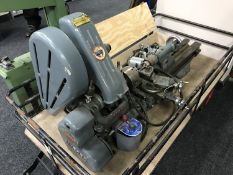 A Myford metal lathe with a box of accessories