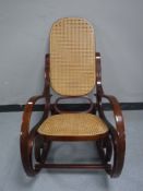 A Bentwood style bergere rocking chair
