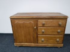 An antique pine dresser base