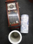 A mid 20th century luggage case together with a Rhythm wall clock and a pair of oriental style