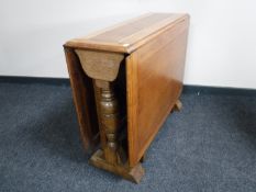 An oak drop leaf table