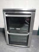 An Electrolux Insight electric cooker in a stainless steel finish