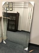 A contemporary all glass mirror,