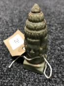 A jade finial depicting Brahmer the four headed god