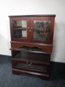 Two mahogany television stands