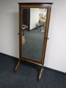 A Victorian inlaid mahogany cheval mirror