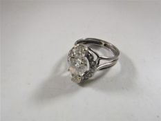 A platinum and diamond ring,