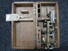 A cased miniature microscope